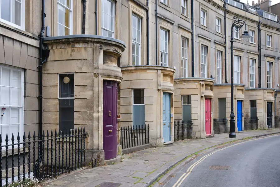 Bath stone Georgian terrace with iron railings, the kind of frontage found in Melksham's conservation area