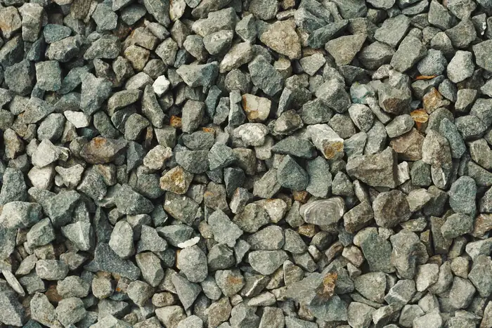 Angular crushed limestone of the type used for a permeable driveway sub-base in Chippenham