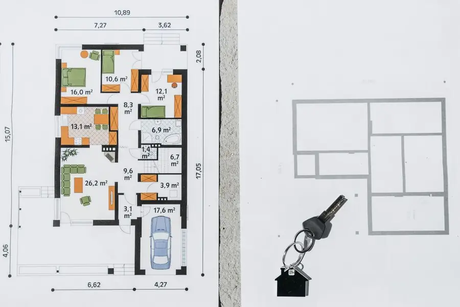 Architectural floor plan showing house dimensions and a marked parking space