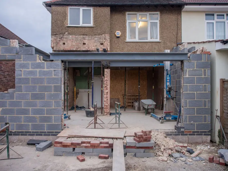 Building work in progress at a British home, a reminder that buildings insurance is based on rebuild cost rather than market value