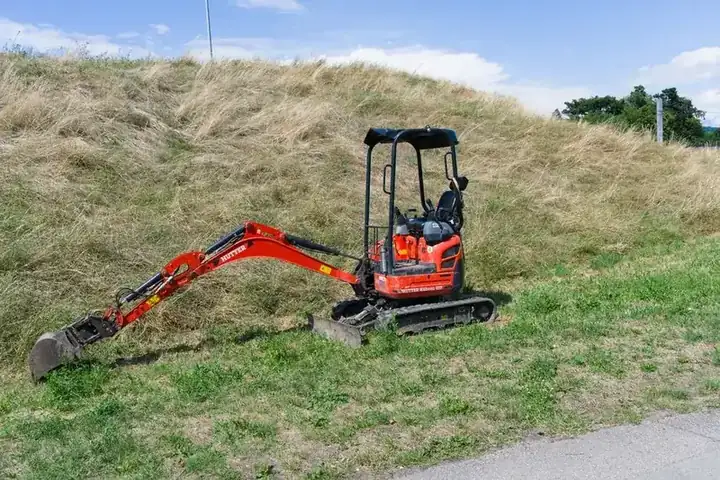 Mini excavator of the type used to dig out an old driveway at a Swindon property