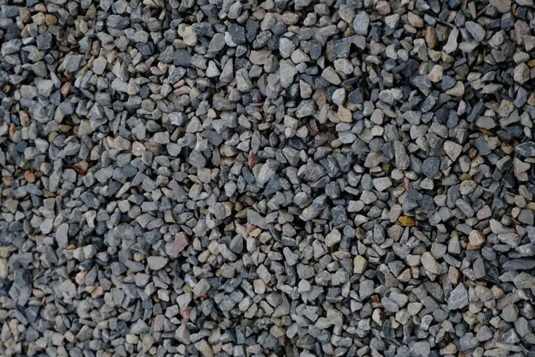 Clean angular crushed stone of the type specified as permeable sub-base on a Swindon resin driveway quote