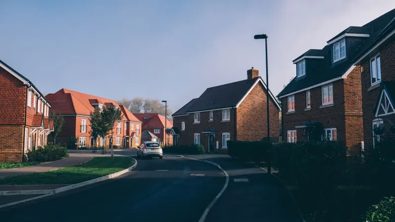 Car parked on a quiet new build street in Swindon, the kind of everyday use a driveway guarantee assumes