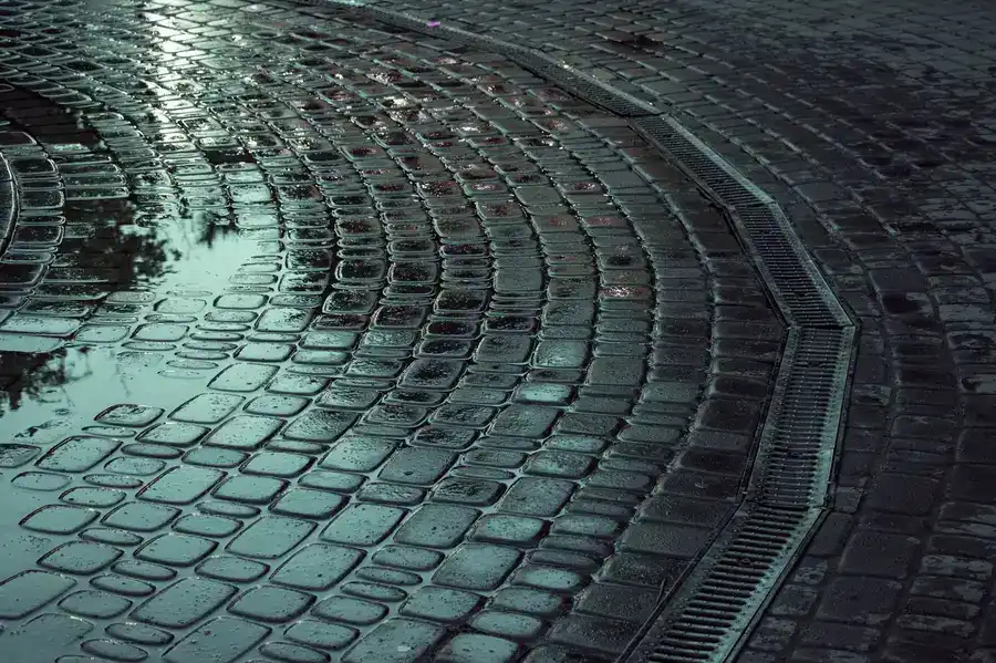 Water draining through a permeable driveway surface