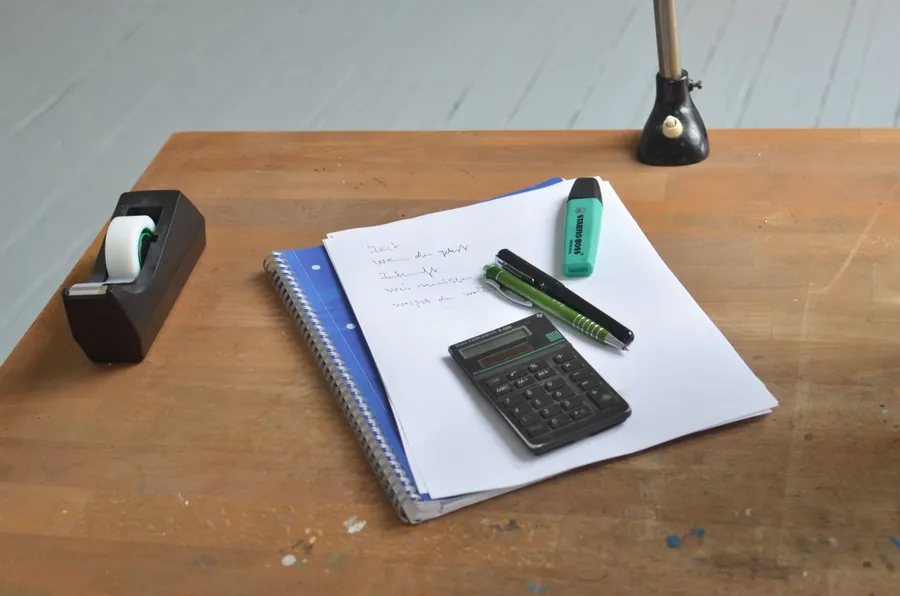 Notepad and calculator used to work out a resin driveway quote for a Calne or Melksham home