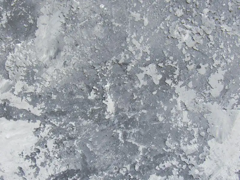 Uneven and patchy failed driveway surface