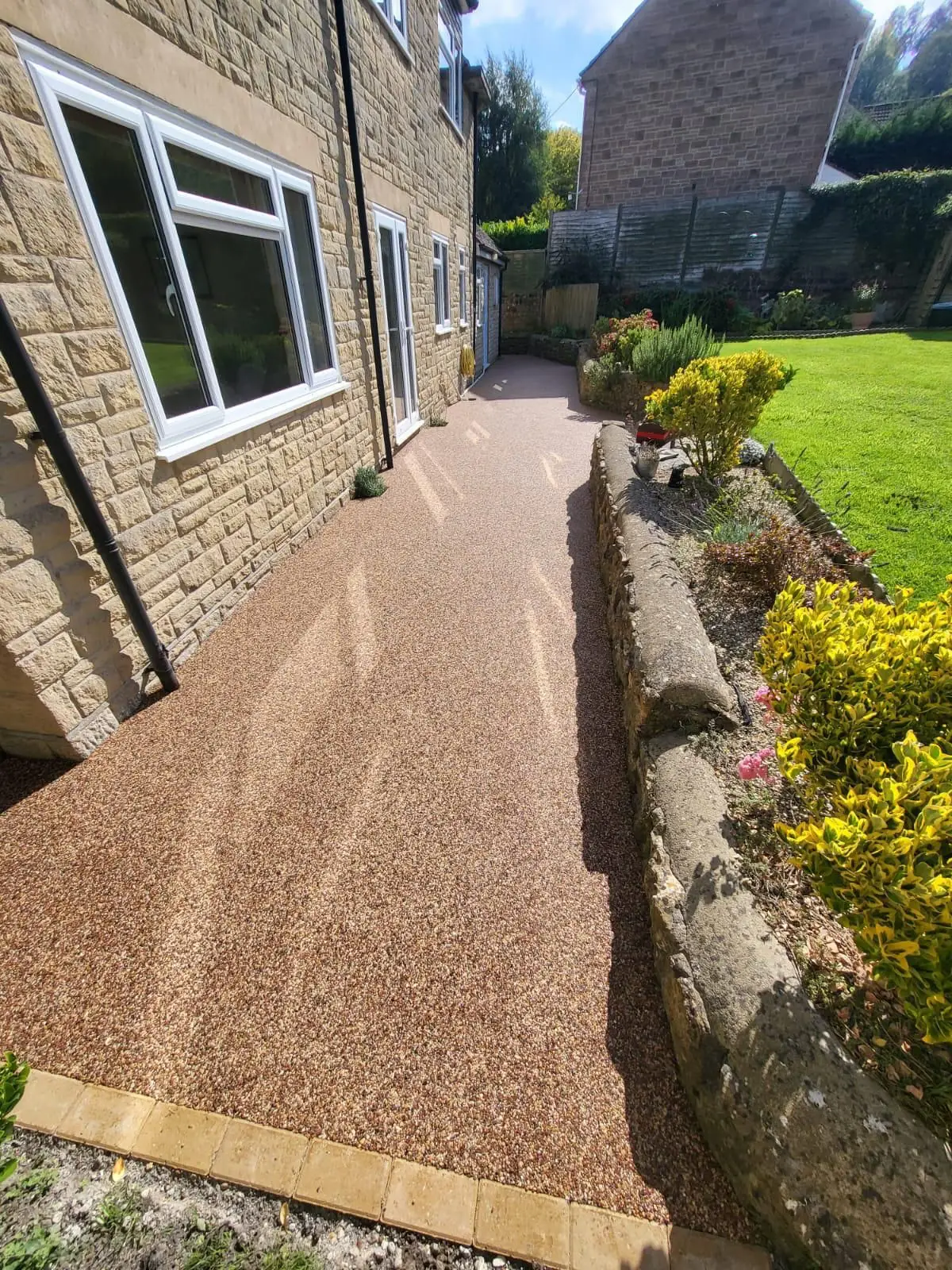 Terracotta resin bound surface example in Swindon